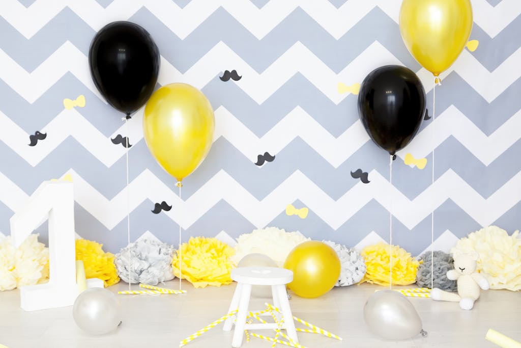 Vibrant first birthday party setup with balloons and festive decor, perfect for celebration themes.